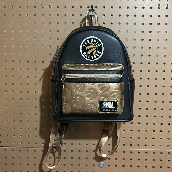 Loungefly Handbags - NBA Toronto Raptors lounge fly mini backpack
